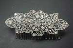 Silver colour comb with flower and leaves. Ref. 29680 18.500€ #5004029680
